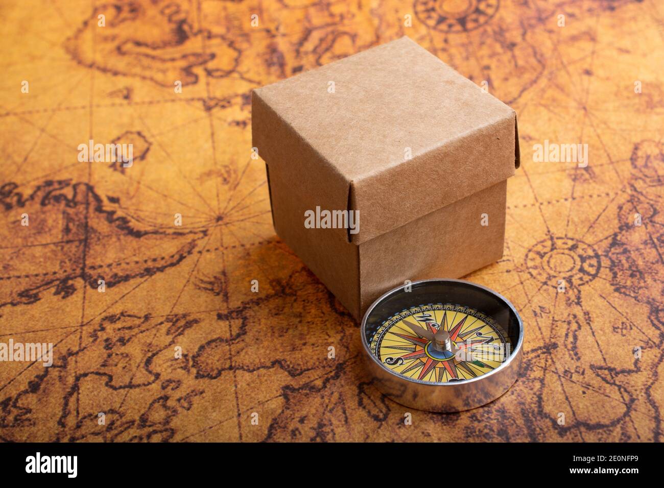 Compass and Chess on old map Stock Photo by ©kwanchaidp 75914687