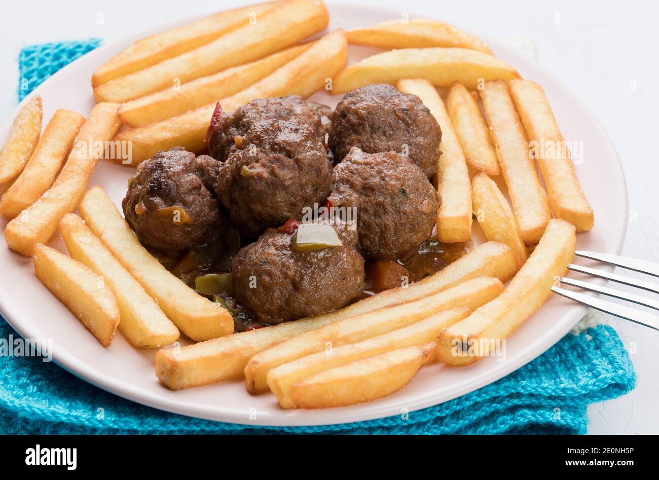 Meatballs with potatoes are an easy, quick to make and very inexpensive homemade stew. It is ideal as a main dish for the whole family, especially Stock Photo