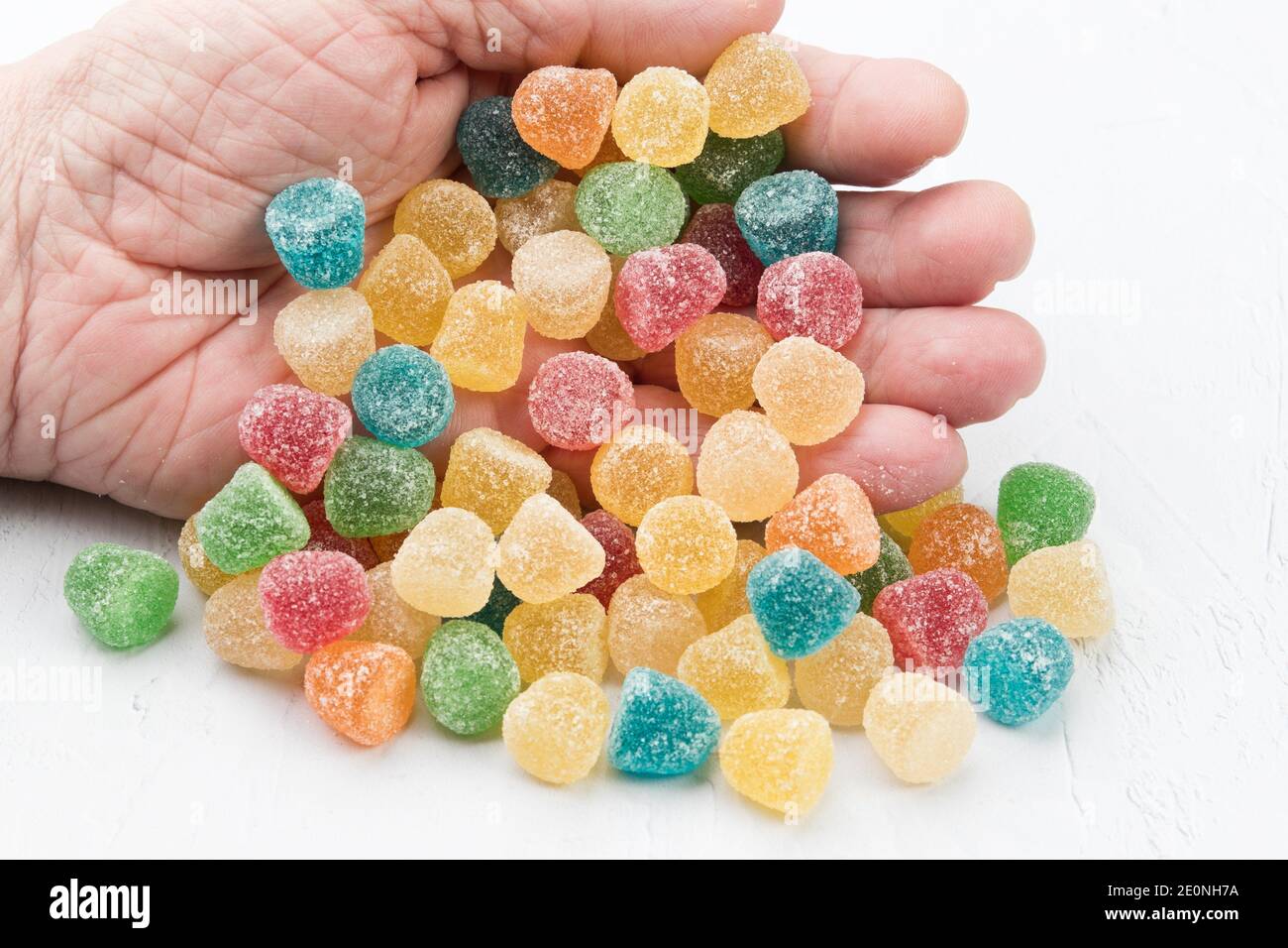 Gummies or gumdrops are very sweet chewy candies, made from animal gelatin  to which sweeteners, flavorings and food coloring are added. They are Stock  Photo - Alamy