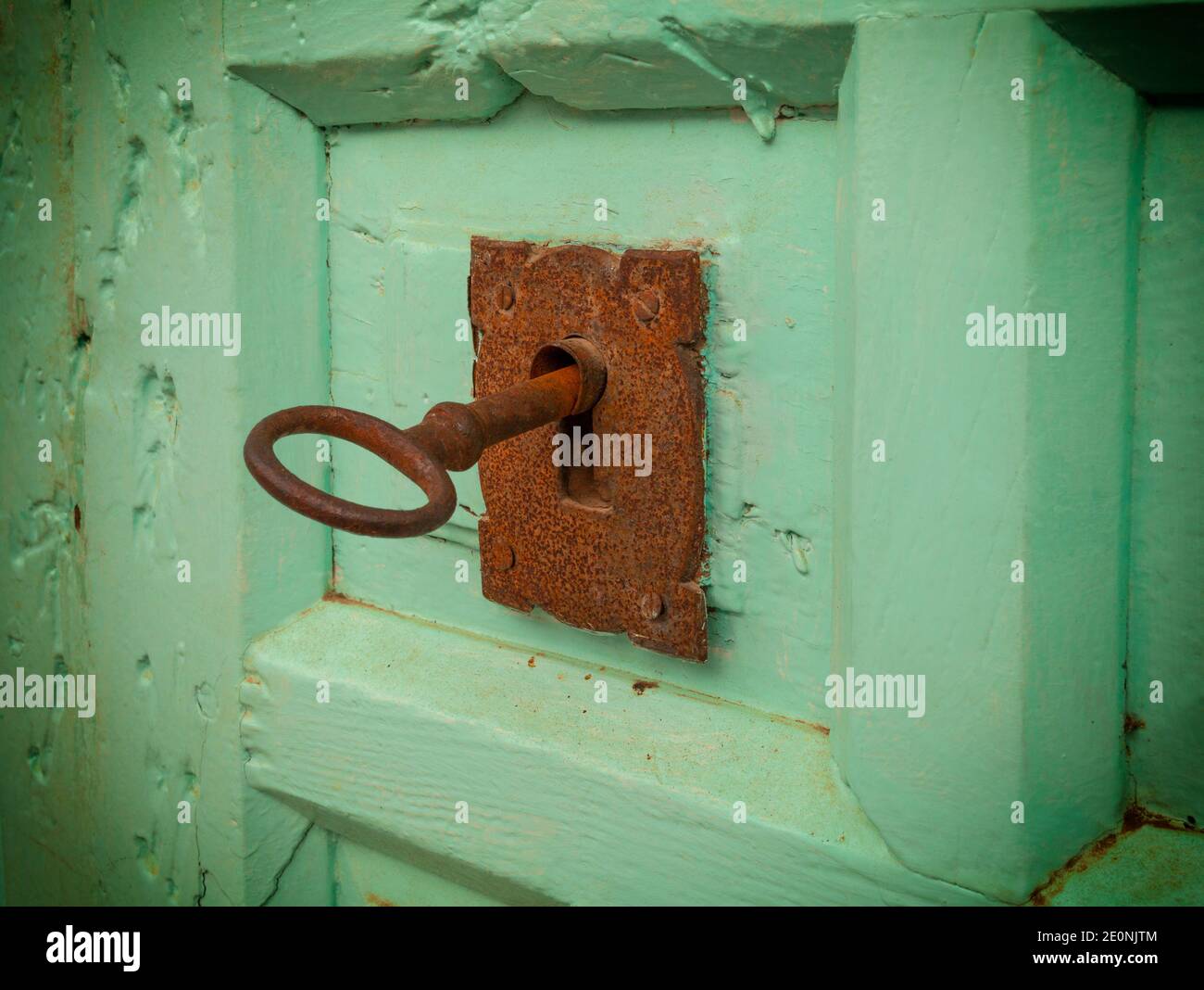 A rusty key and door lock in the white village of Frigiliana,  Malaga Province, Andalucia, Spain Stock Photo