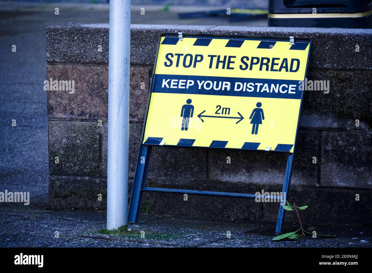Stop the spread keep your distance sign during the pandemic Stock Photo ...