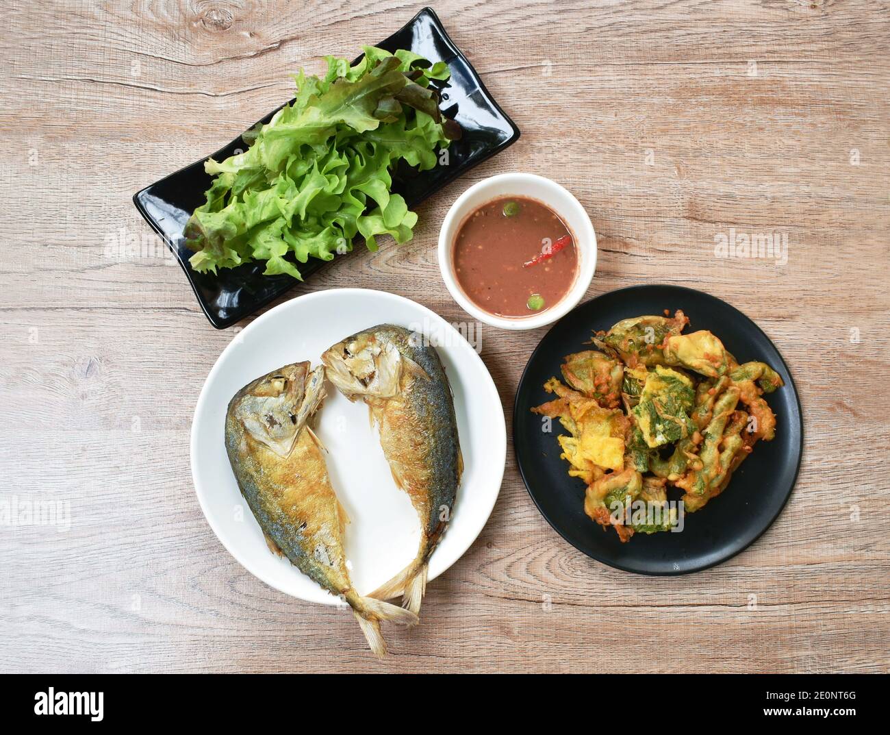 deep fried mackerel fish dipping spicy shrimp paste sauce eat with fried egg and fresh vegetable