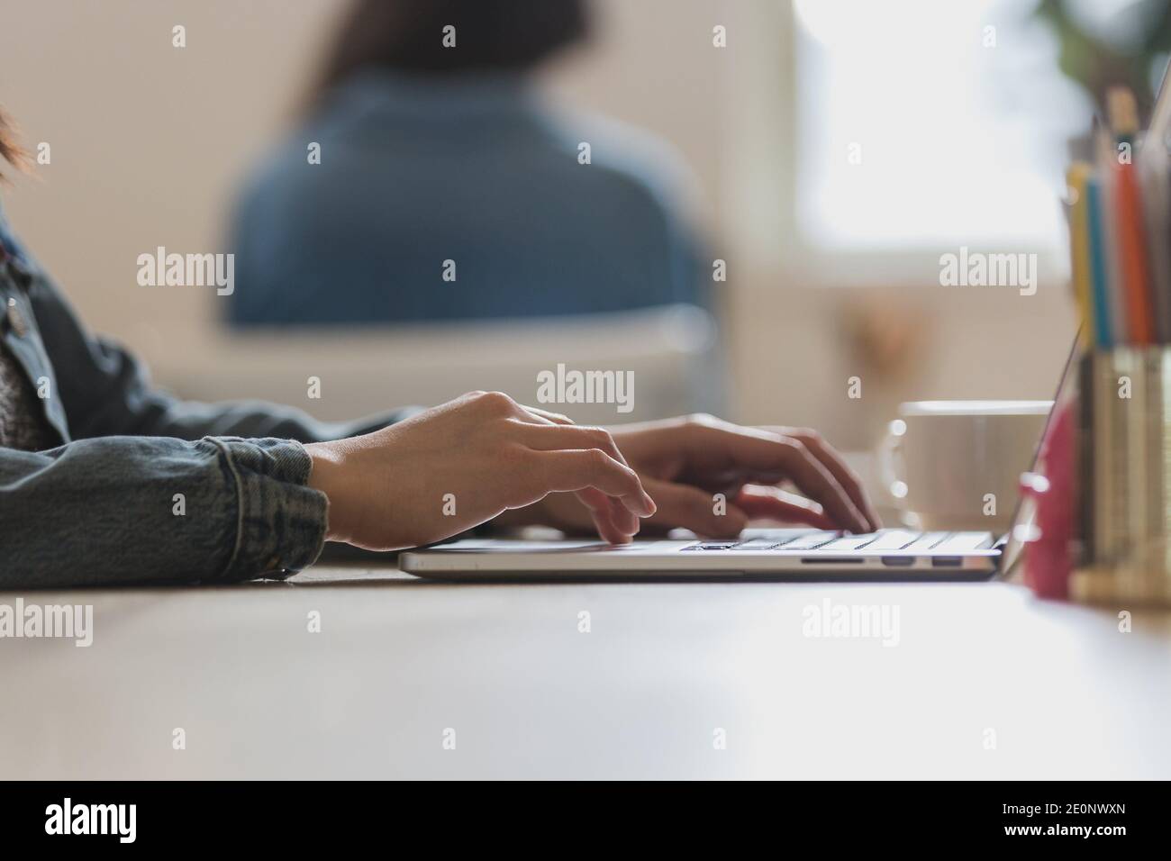 typing at desk Stock Photo - Alamy