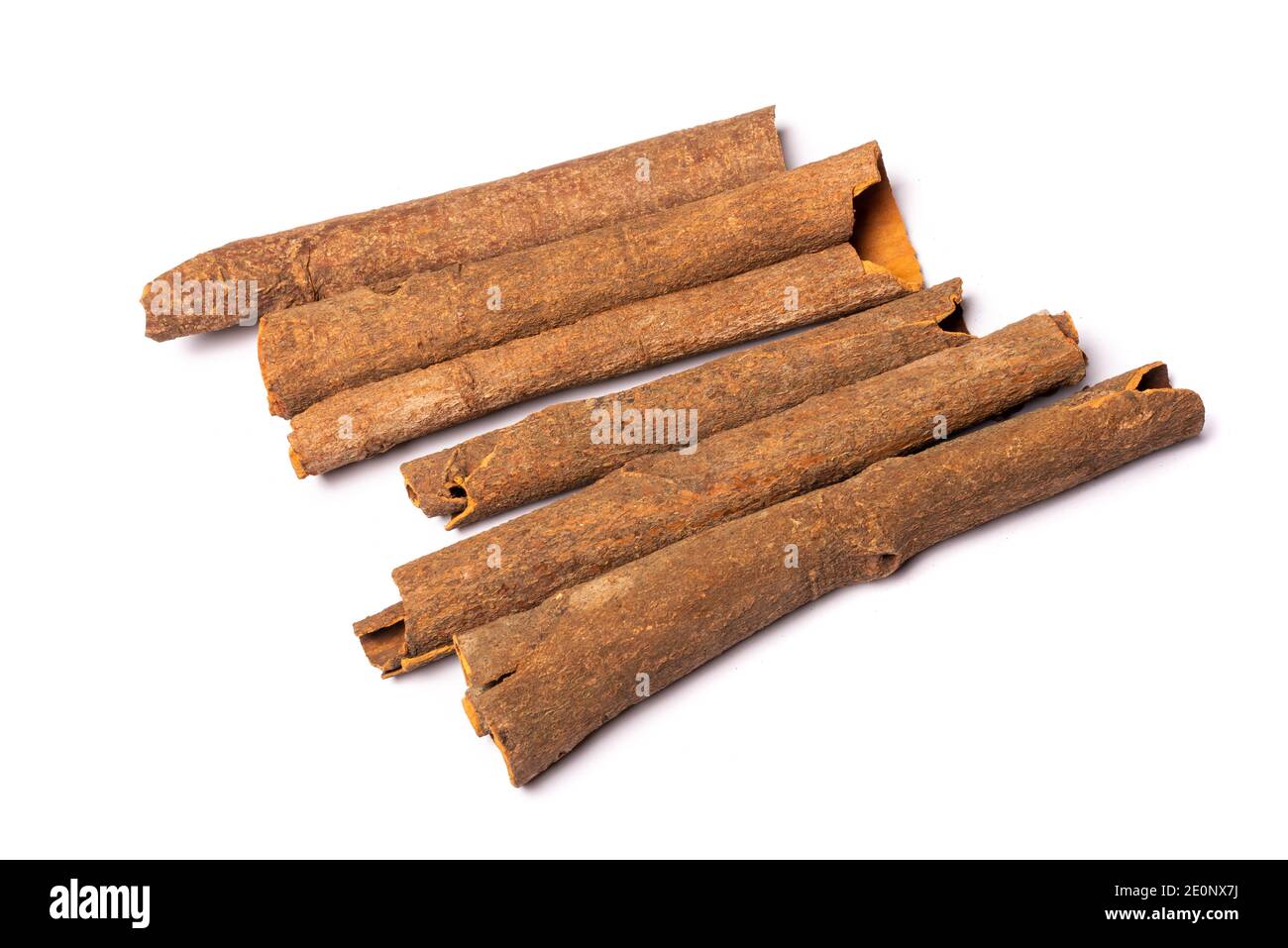 Cinnamomum tamala barks heap close-up view on a white background Stock Photo