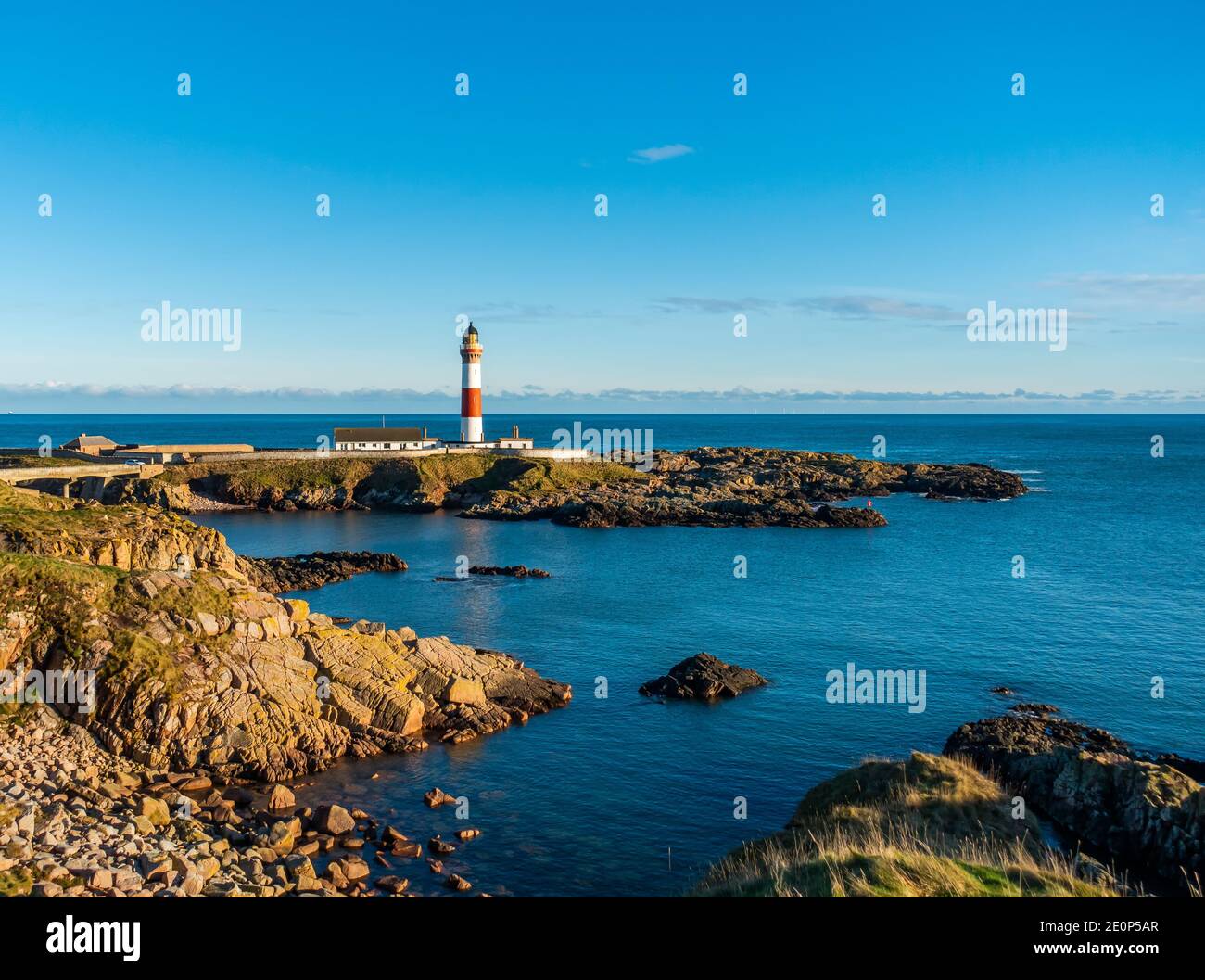 The red and white lighthouse at the village of Boddam near Peterhead in Aberdeenshire, Scotland, UK Stock Photo