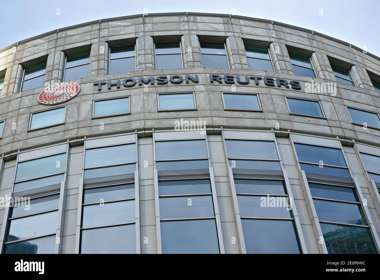 London, United Kingdom - February 03, 2019: Sun shines on Thomson Reuters offices building at Canary Wharf in UK capital. TR Group is Canadian multina Stock Photo