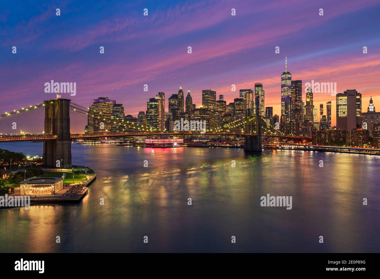 Skyline of Manhattan and Brooklyn Bridge at night, New York City Stock Photo