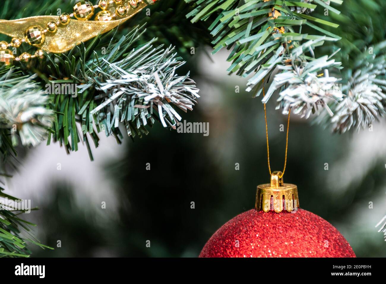 Horizontal Christmas Card 2021, 2022. Red Ball With Diamonds. Copy-Space For Companies And Individuals. Greeting Card With Bokeh Background, Colours R Stock Photo - Alamy