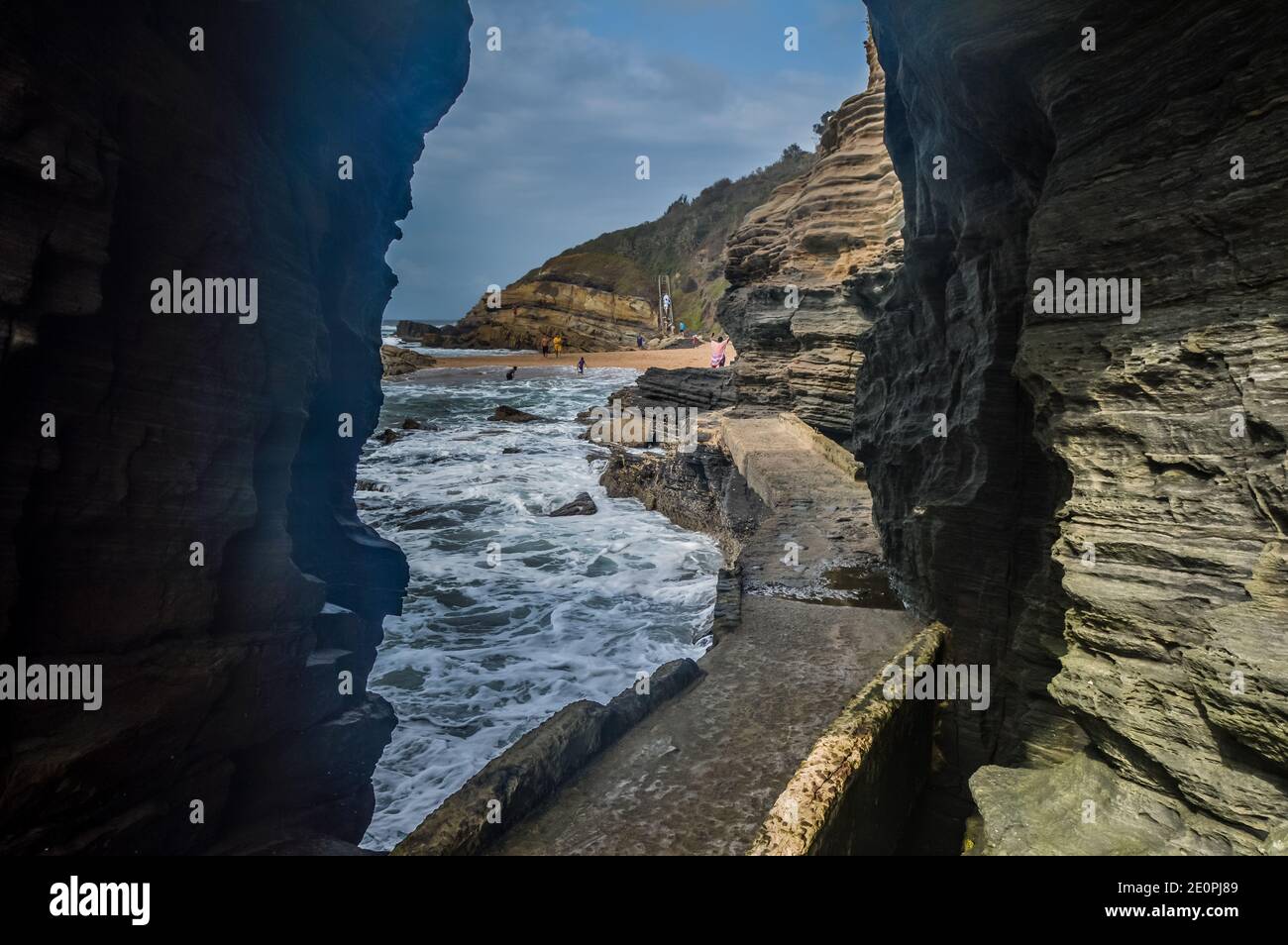 Hole in the wall natural rock formation at Thompsons bay beach ballito South Africa Stock Photo