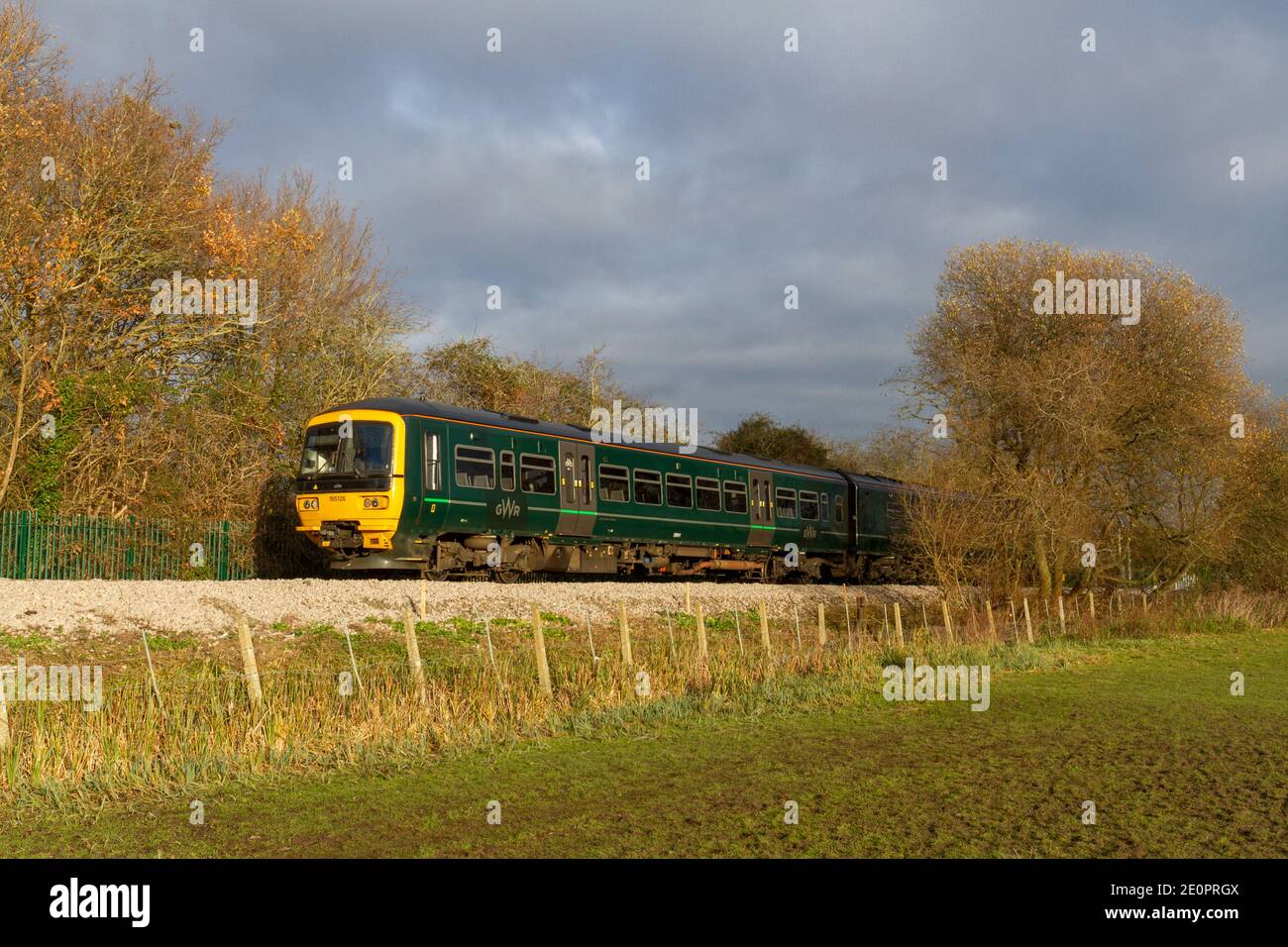 A GWR class 165 train on the Marlow branch line ('The Marlow Donkey') beside the River Thames, Bourne End, UK. Stock Photo