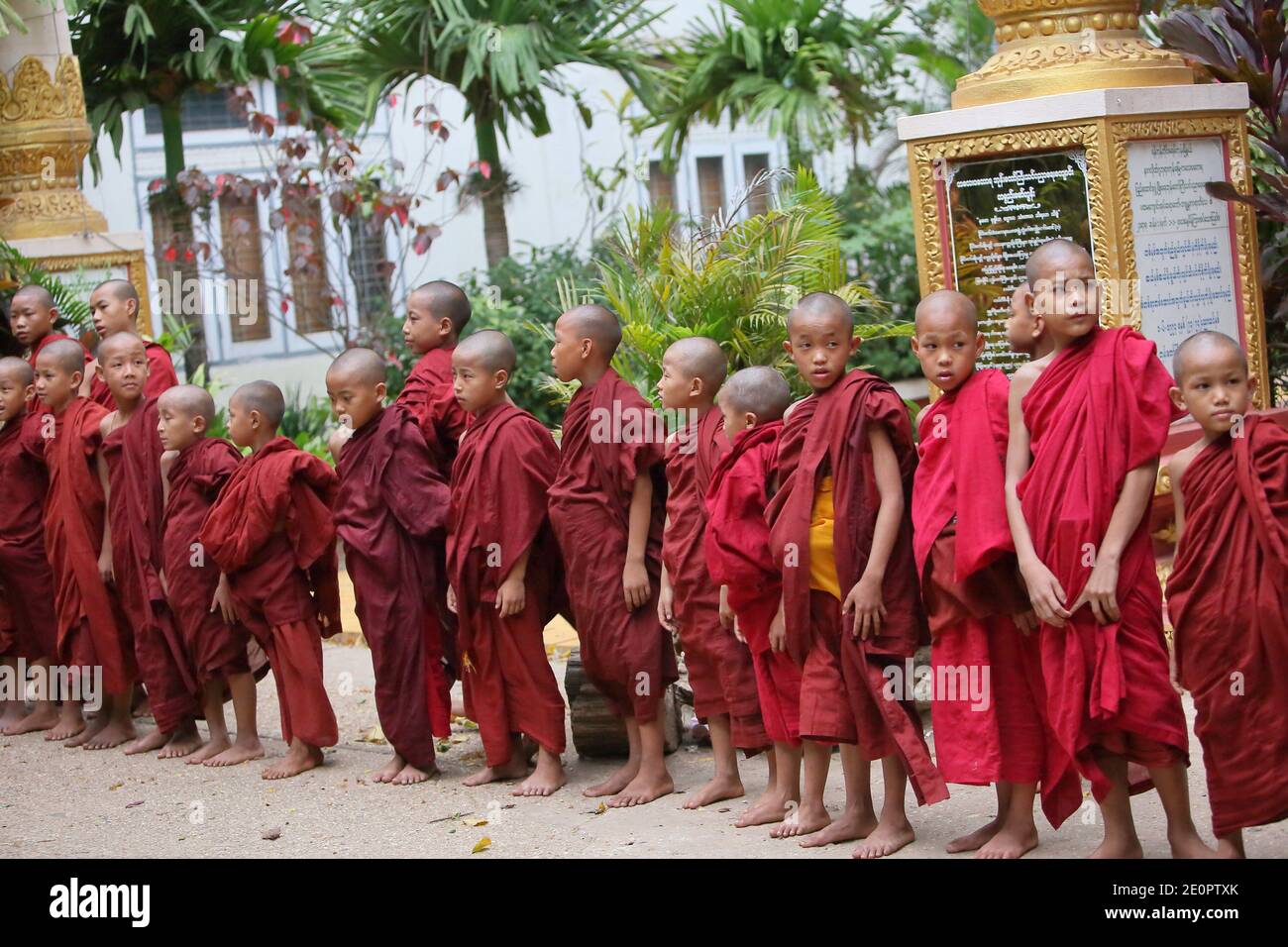 Novice monks in the Shwe Yaunghwe Kyaung Monastery, near Nyaungshwe, Shan State, Myanmar Stock Photo