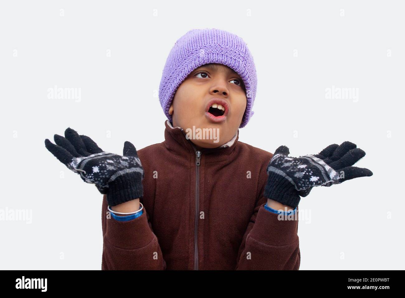 Boy wearing hat and gloves hi-res stock photography and images - Alamy