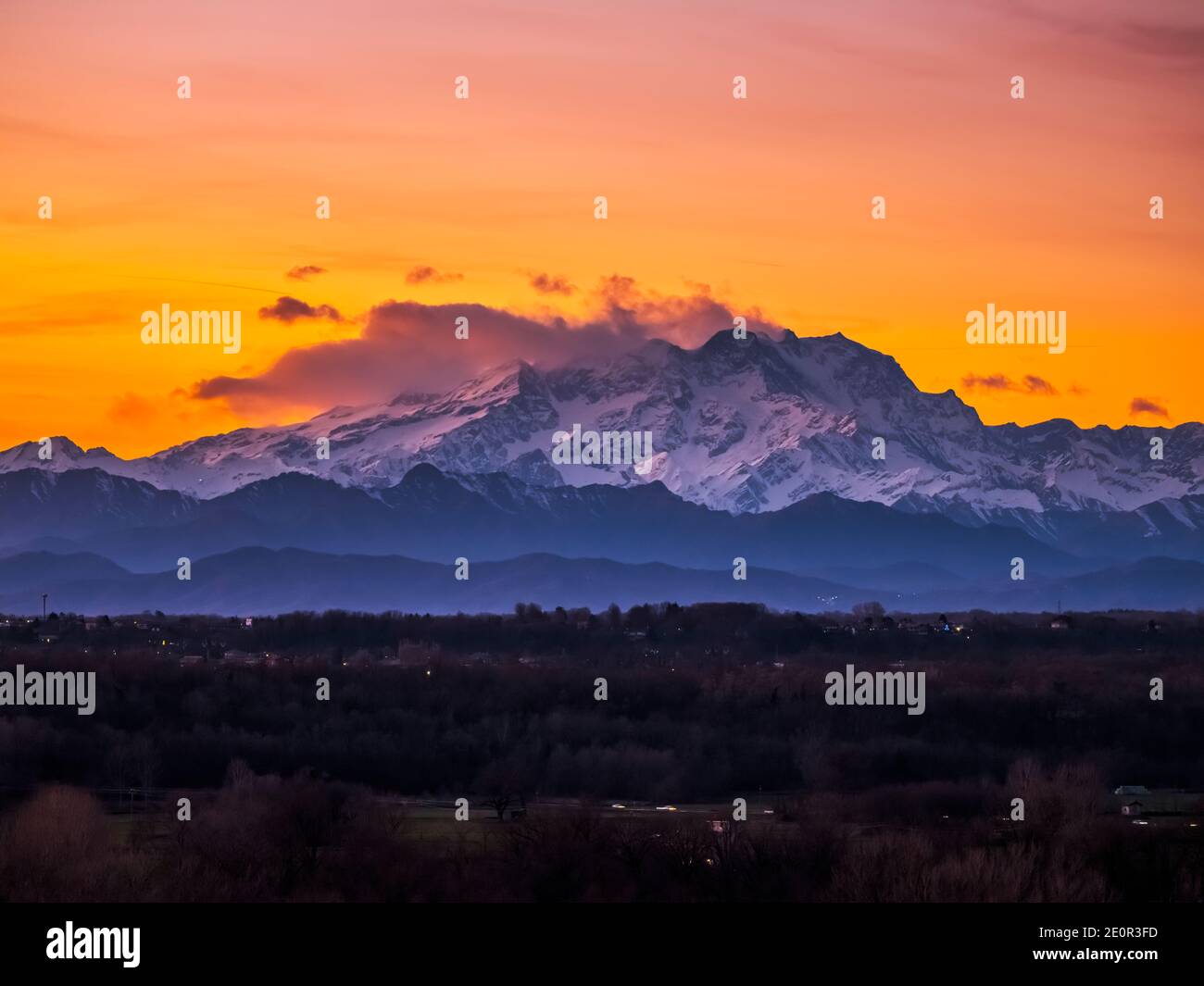 View of the Lombard Alps, the Monte Rosa chain shrouded in clouds at ...
