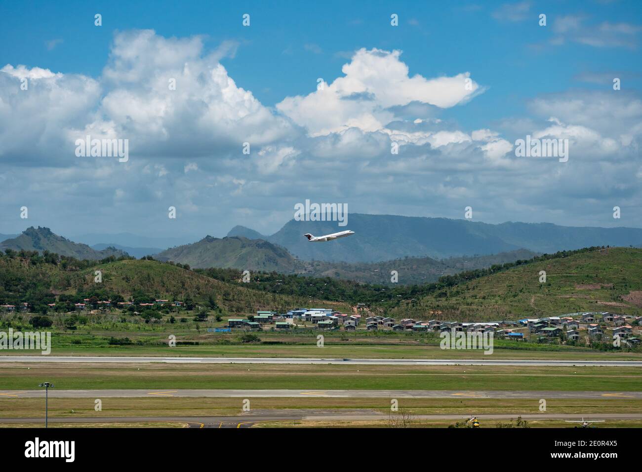 Fokker 70 from Air Niugini taking off from Jacksons International Airport in Port Moresby, the capital of Papua New Guinea. Stock Photo