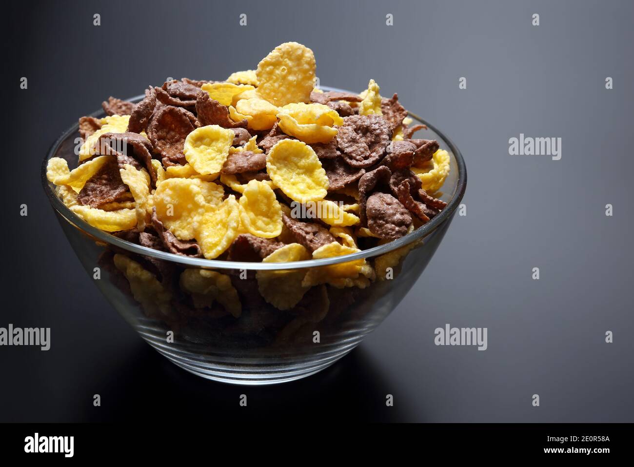 colored corn flakes in a bowl Stock Photo Alamy