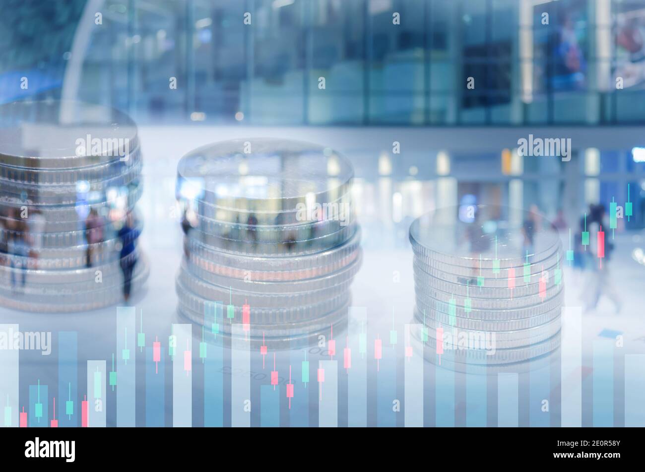 rows of coins for finance and stock market investment graph double exposure of city business banking concept. investment and stock future trading Stock Photo