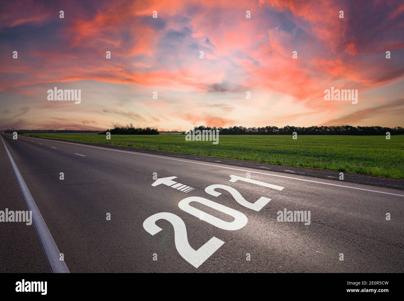 New Year 2021 the way to go concept. 2021 Start written on the asphalt ground at sunny day. Concept of planning and challenge or career path, business Stock Photo
