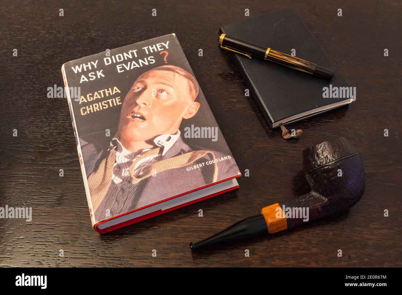 London, England, UK - January 2 2021: Why didn't they ask Evans Book by Agatha Christie in a Facsimile First Edition with Tobacco Pipe, Fountian Pen a Stock Photo