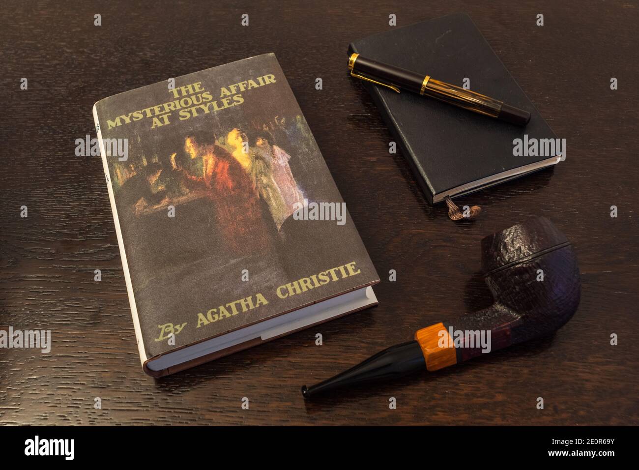 London, England, UK - January 2 2021: The Mysterious Affair at Styles Book by Agatha Christie in a Facsimile First Edition with Tobacco Pipe, Fountian Stock Photo