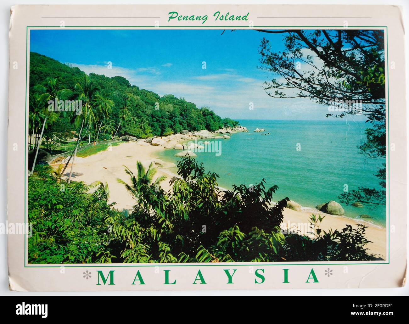 Old Post card showing the beach at Moonlight Bay, Penang Island, Malaysia. 1980’s Stock Photo