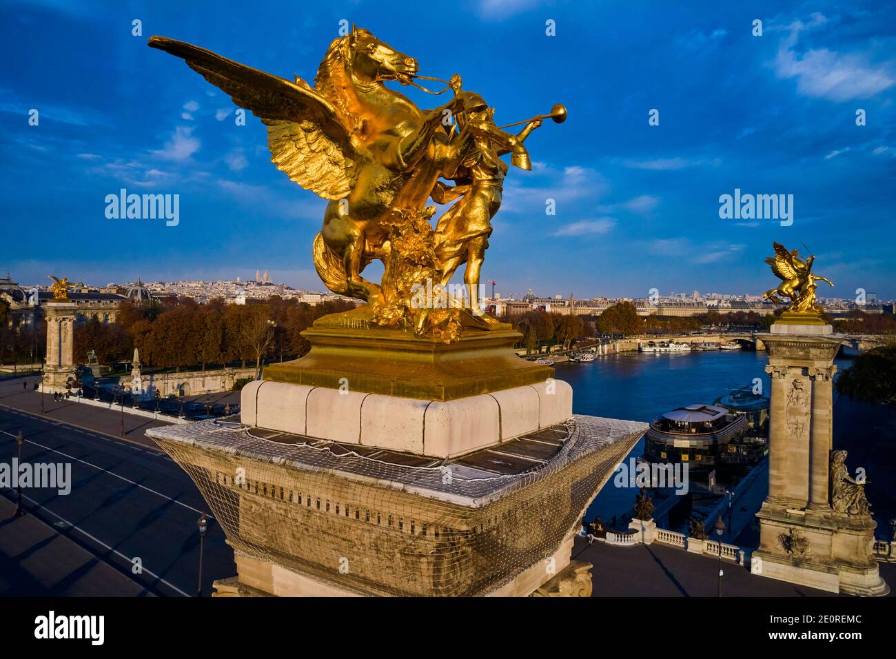 France, Paris, Alexandre III bridge, sculpture by Leopold Steiner representing the Fame of the War accompanied by Pegasus Stock Photo