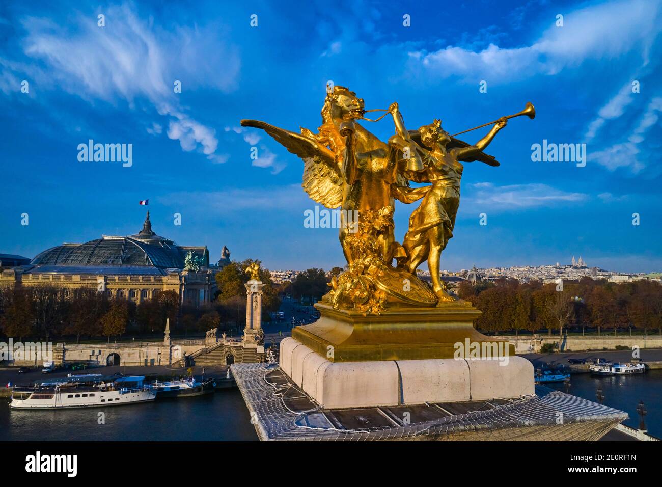 France, Paris, Alexandre III bridge, sculpture by Leopold Steiner representing the Fame of the War accompanied by Pegasus Stock Photo