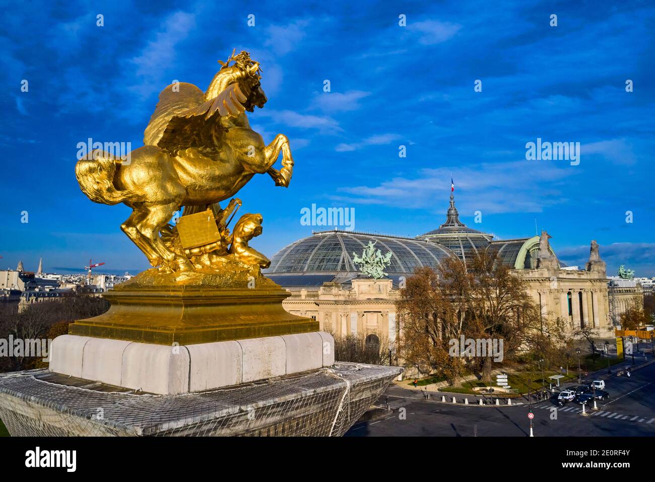 France, Paris, Alexandre III bridge,  and Grand Palais, the Alexandre III bridge, sculpture of the Renown of the arts by Emmanuel Frémiet and the Gran Stock Photo