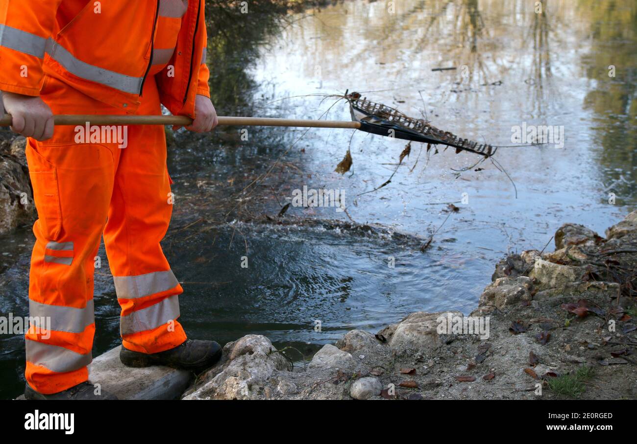 Pond Cleaning Stock Photo