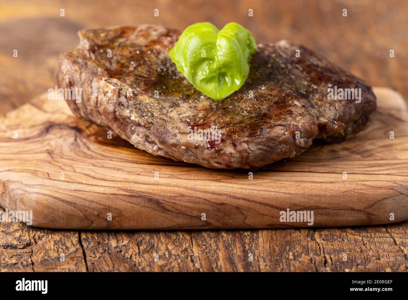 Steak With Basil Stock Photo Alamy