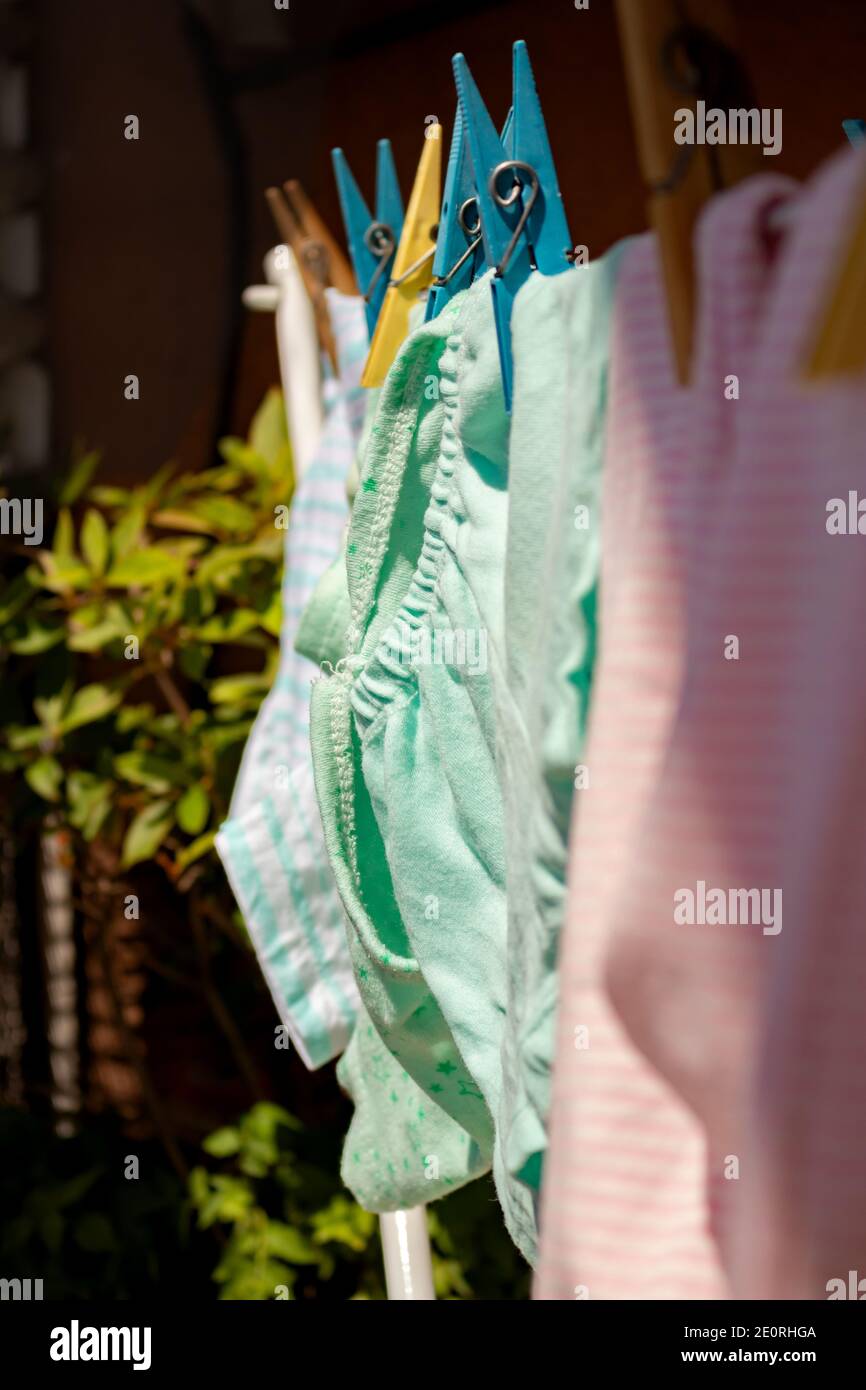 Clothes hanging in the sun hires stock photography and images Alamy