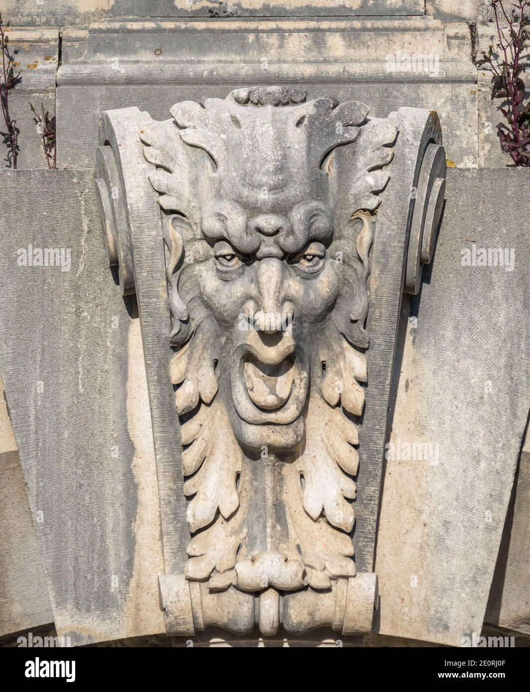 Gargoyle's head architecture ornament at Peles Castle in Sinaia, Romania. Stock Photo