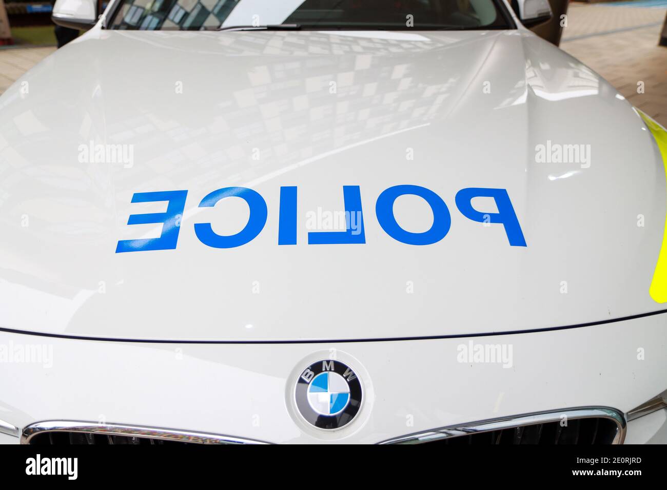 A close up photo of a British police car from the West Yorkshire police sowing the side of the car Stock Photo