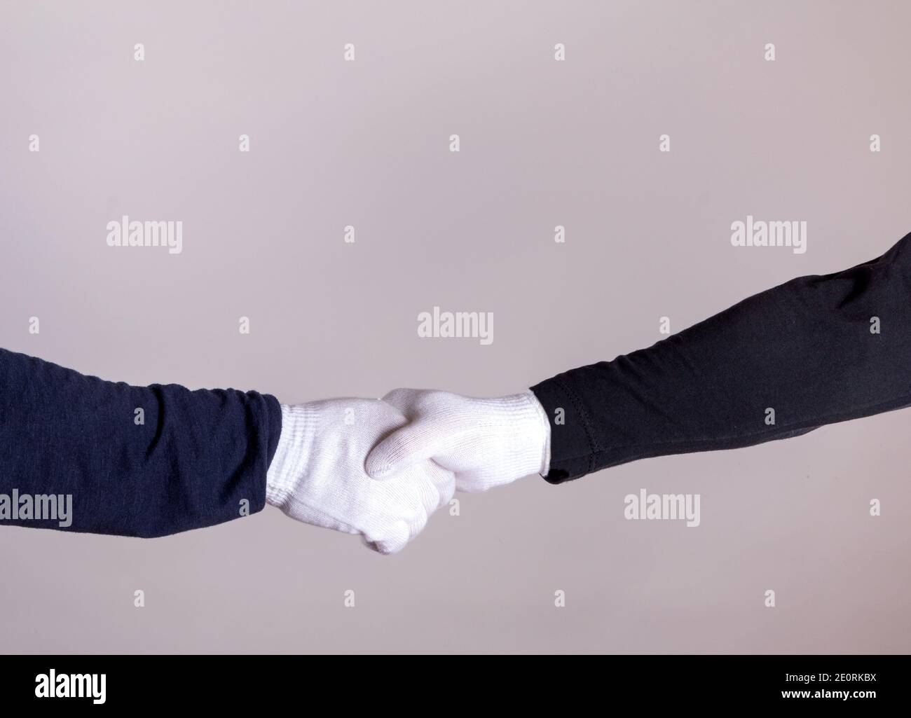Handshake With White Gloves Stock Photo