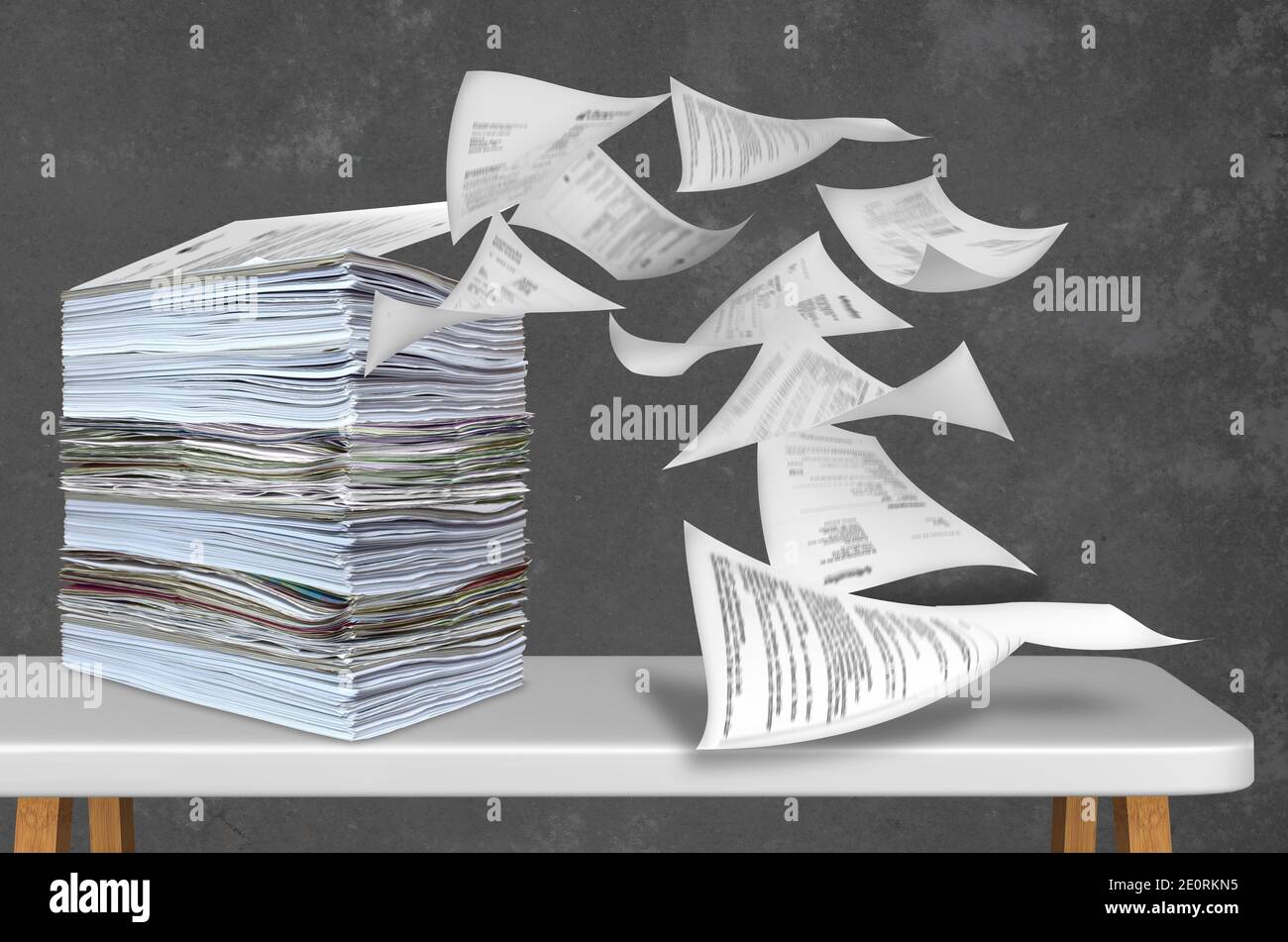 big pile of paper being blown away Stock Photo
