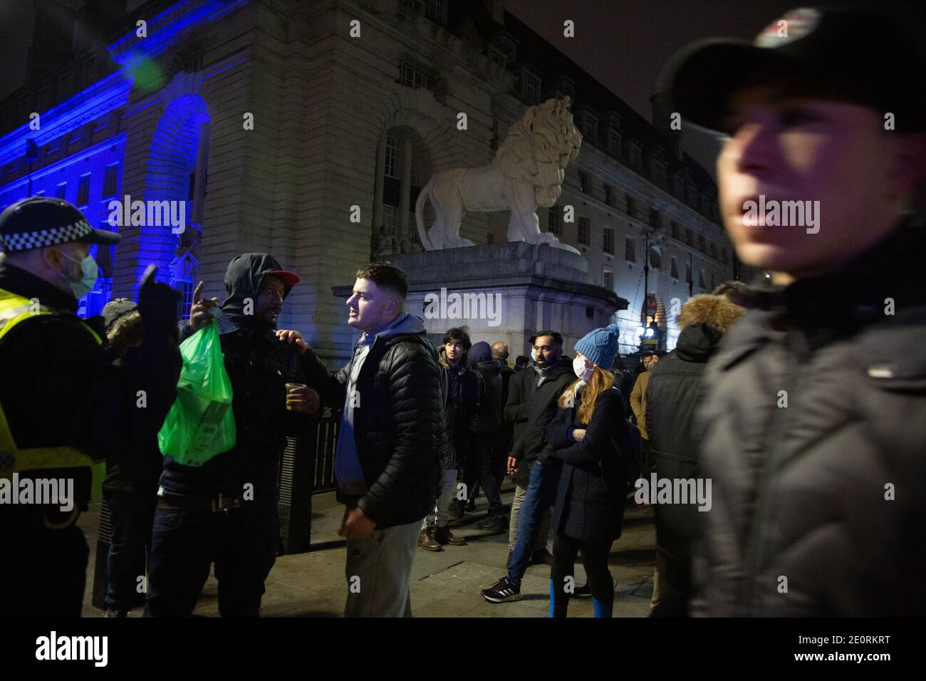 An anti lockdown protest takes place on New Year's Eve on London's South Bank. — 31. December 2020, England, London, UK Stock Photo