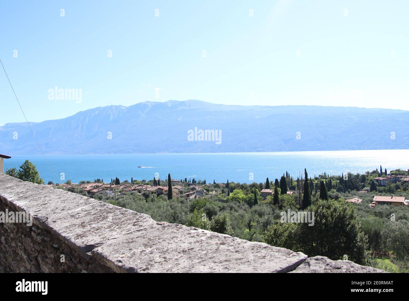 Panoramic view of Lake Garda (Lago di Garda or Benaco), the largest lake in Italy. Lake Garda is a popular holiday location on the edge of the Dolomit Stock Photo