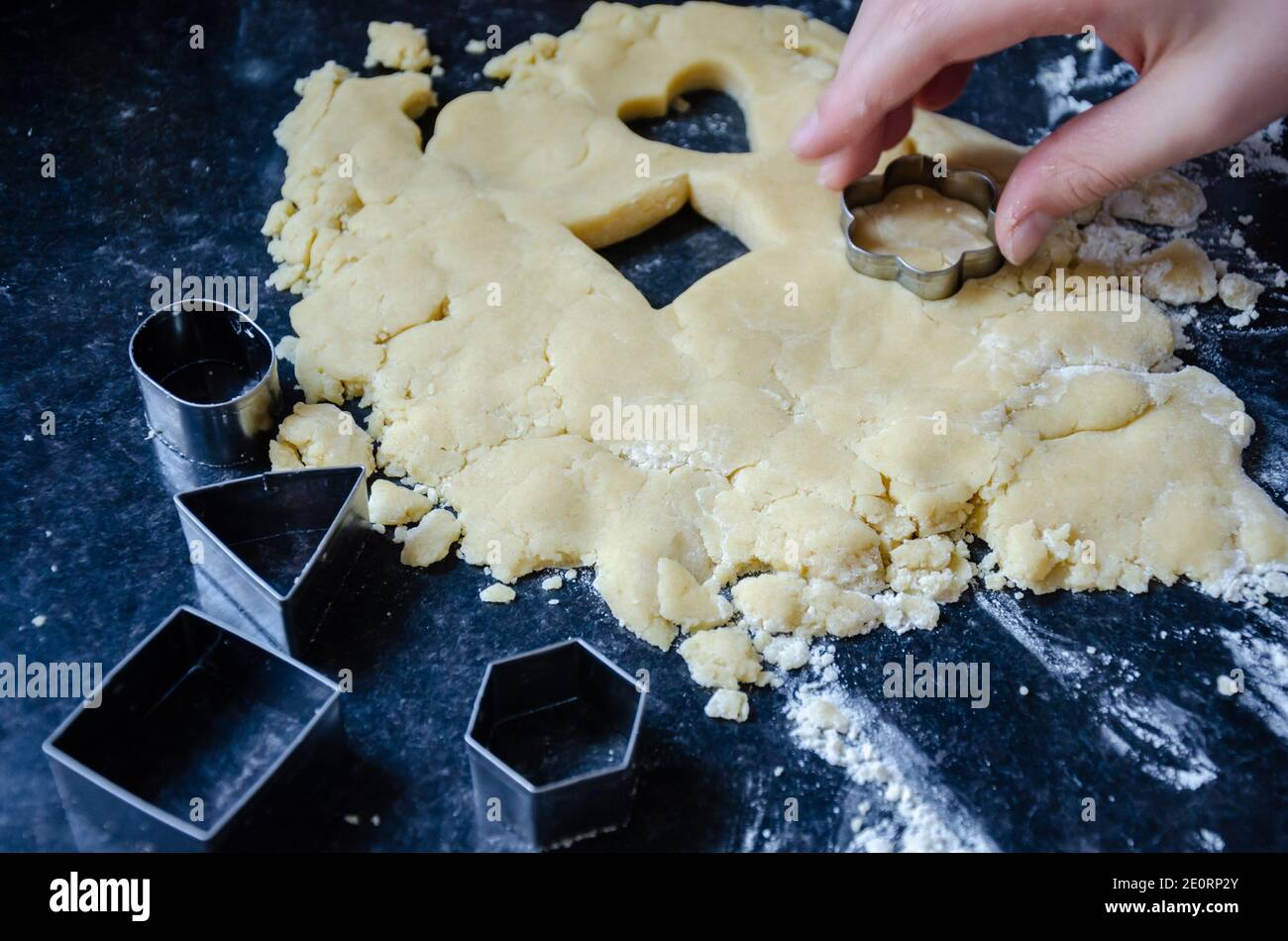 Shortbread cookie dough and pastry cutters on a residential kitchen