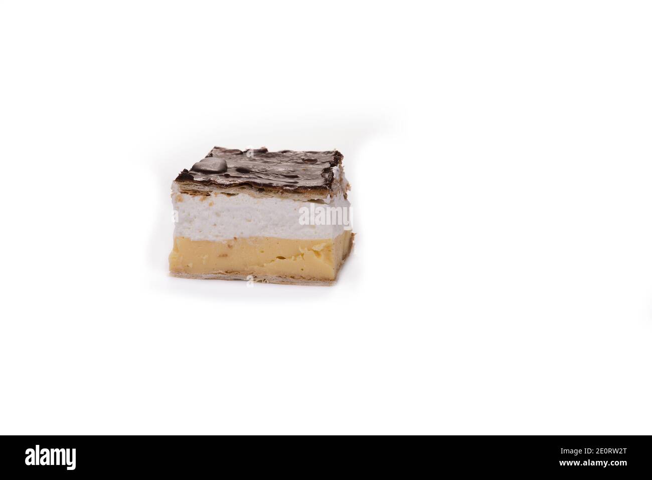 Chocolate cake with pudding and whipped cream. Kremes Stock Photo Alamy