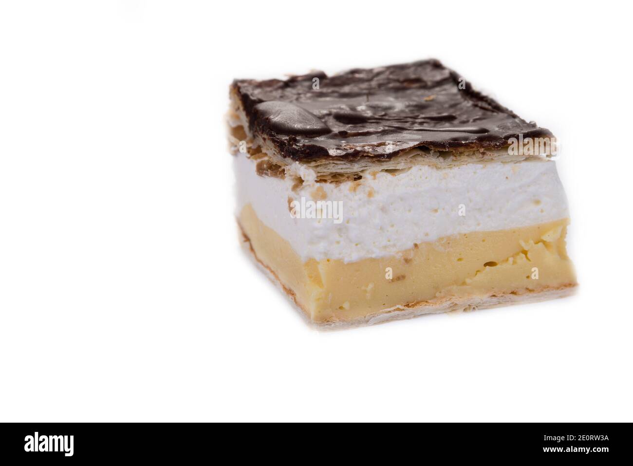 Chocolate cake with pudding and whipped cream. Kremes Stock Photo Alamy