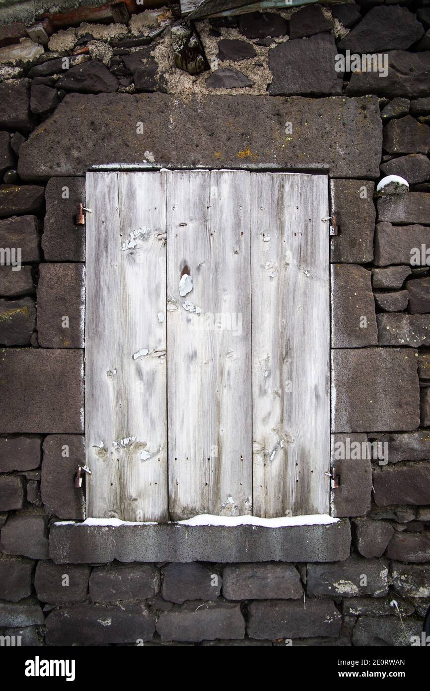 Boarded up window in an abandoned village house in (Auvergne), France ...