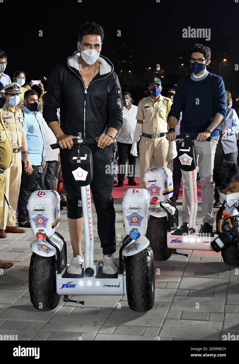 Bollywood actor, Akshay Kumar rides on a Segway during the launch. Segway was launched for the police personnel to patrol the promenade at Worli sea face. Stock Photo