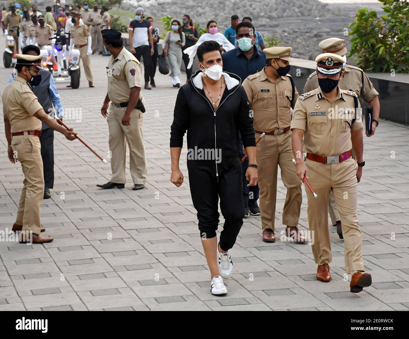 Bollywood actor, Akshay Kumar with police personnel during the launch. Segway was launched for the police personnel to patrol the promenade at Worli sea face. Stock Photo