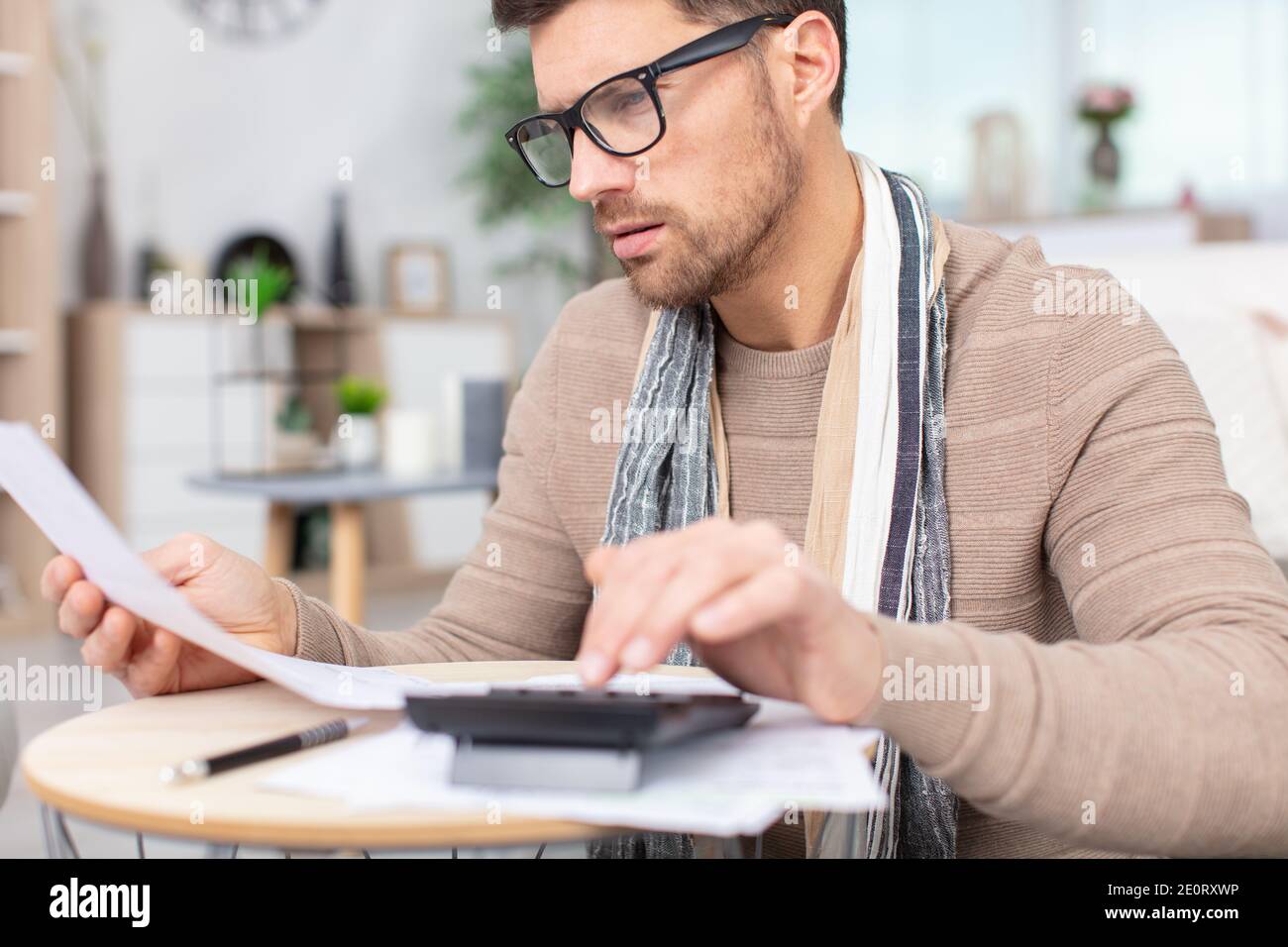 man doing his accounting financial adviser working Stock Photo