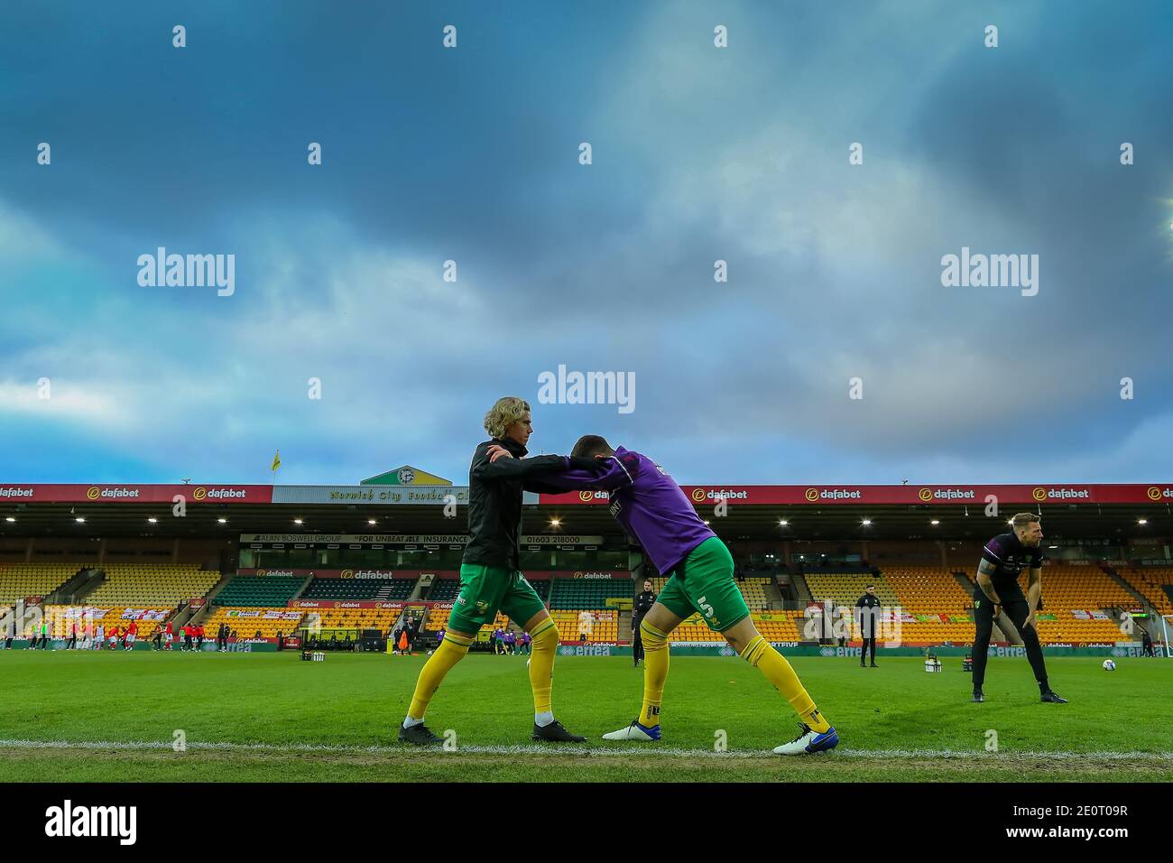 2nd January 2021; Carrow Road, Norwich, Norfolk, England, English Football League Championship Football, Norwich versus Barnsley; Todd Cantwell of Norwich City warms up with Grant Hanley Stock Photo