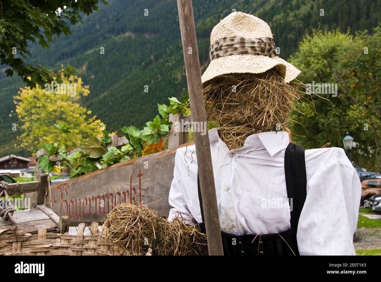 An Austrian scarecrow welcomes visitors to the farmers market in village of Krimml, Austria. Stock Photo