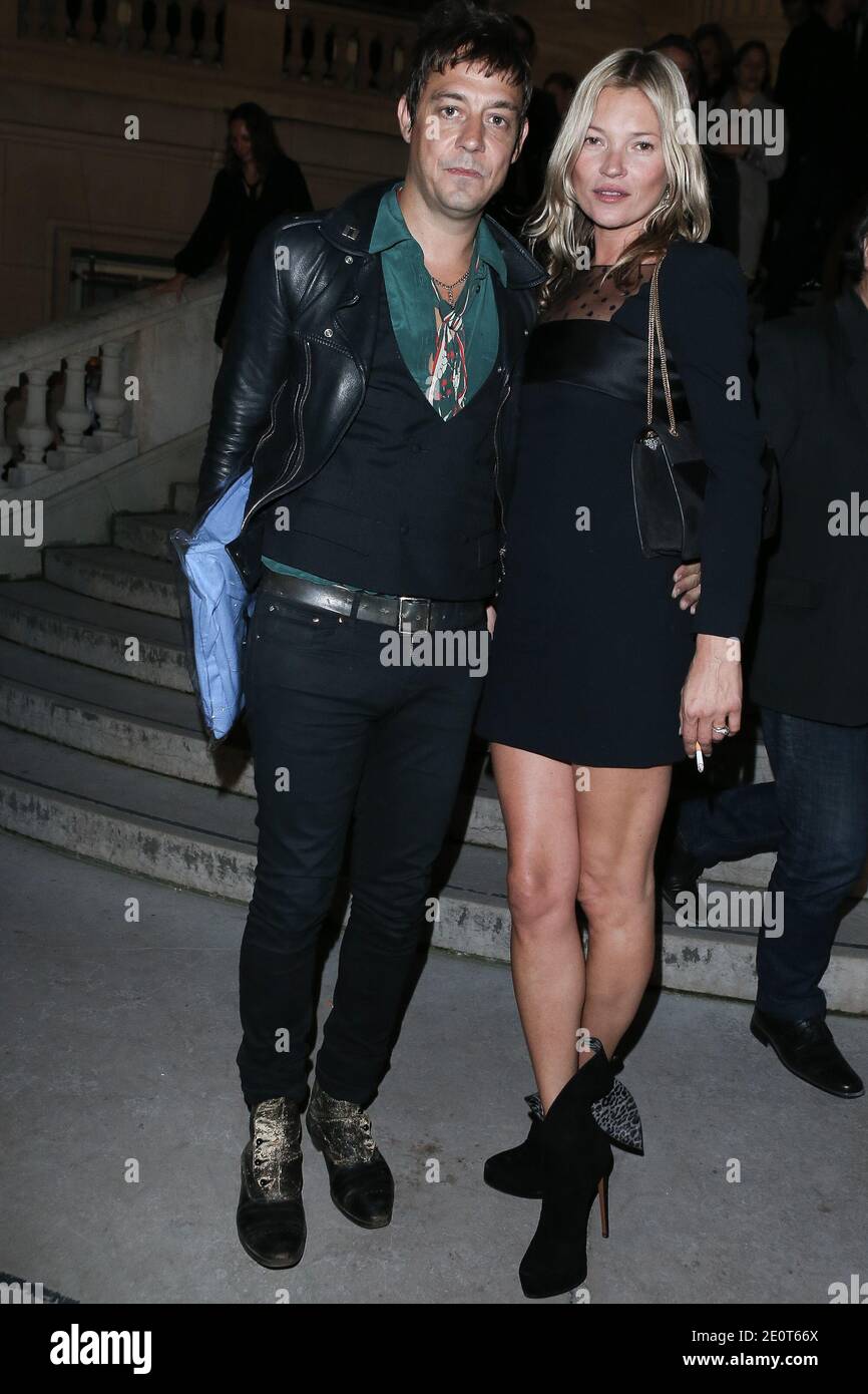 Kate Moss and Jamie Hince leave after the Saint Laurent Spring -Summer 2013 Ready-to-Wear show as part of Paris Fashion Week in Paris, France, October 1, 2012. Photo by Frederic Nebinger/ABACAPRESS.COM Stock Photo