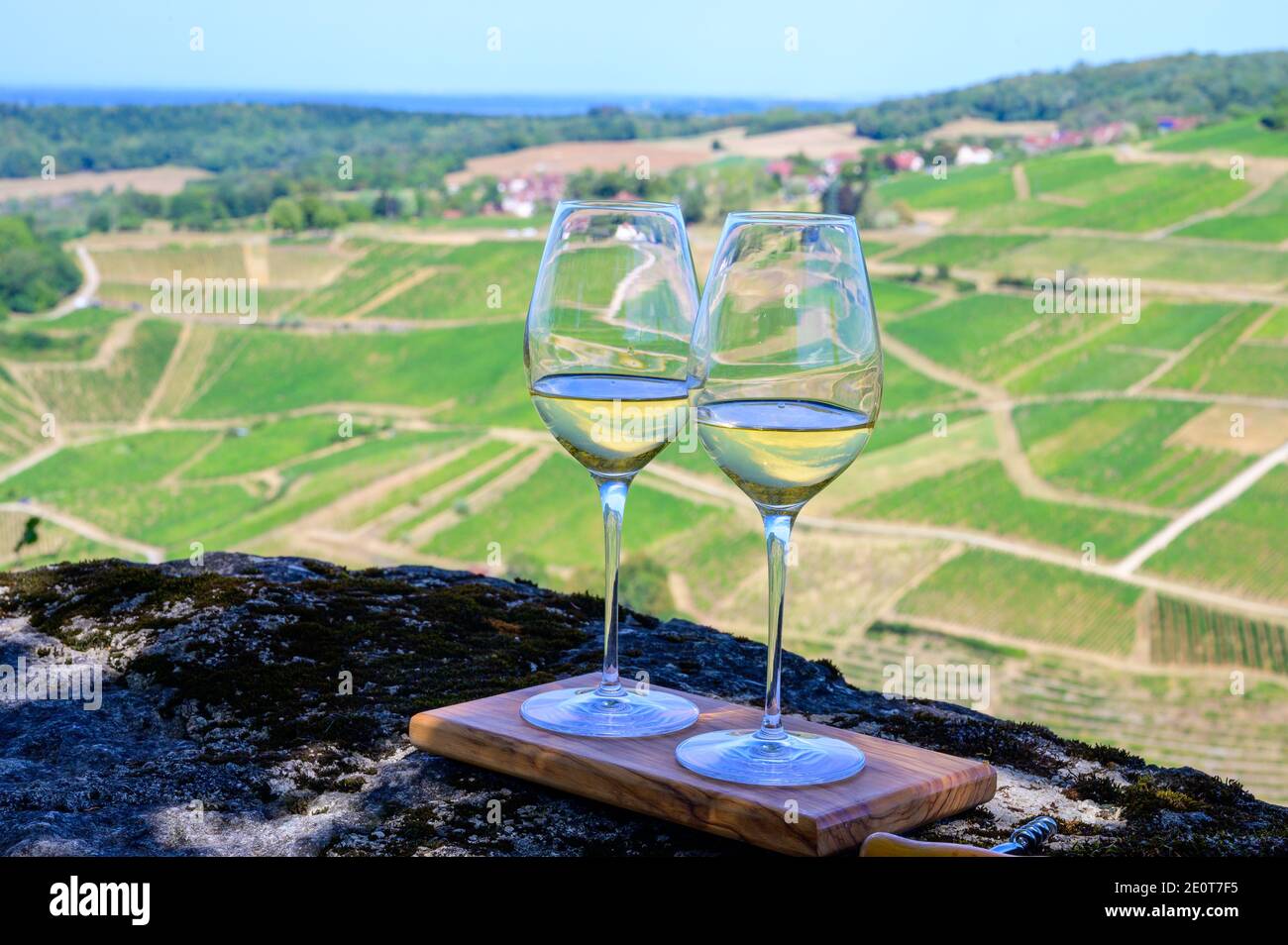 Outdoor tasting of white or jaune Jura wine on vineyards near Chateau