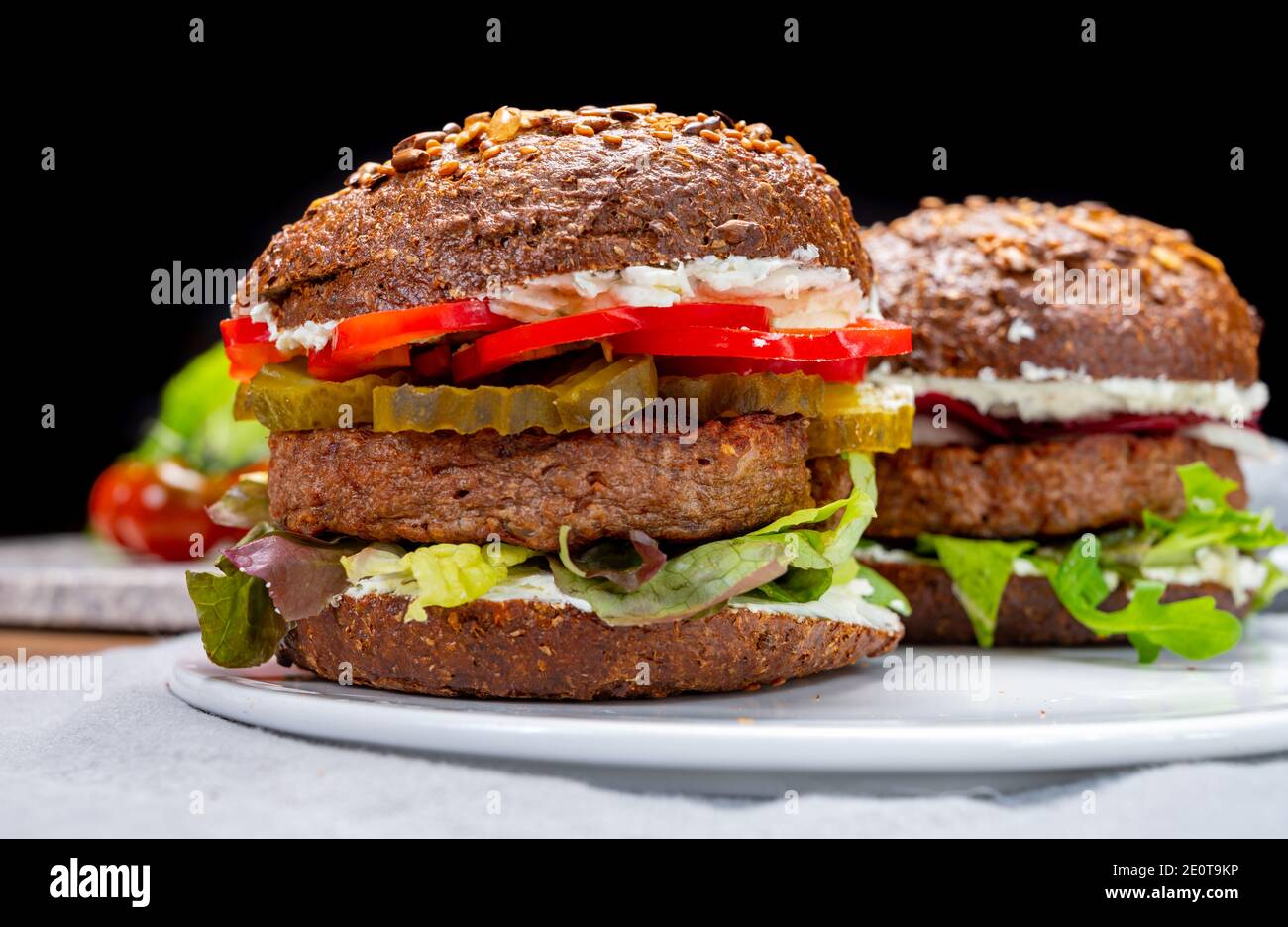 Vegan hamburgers with grilled healthy plant based, meat free burgers