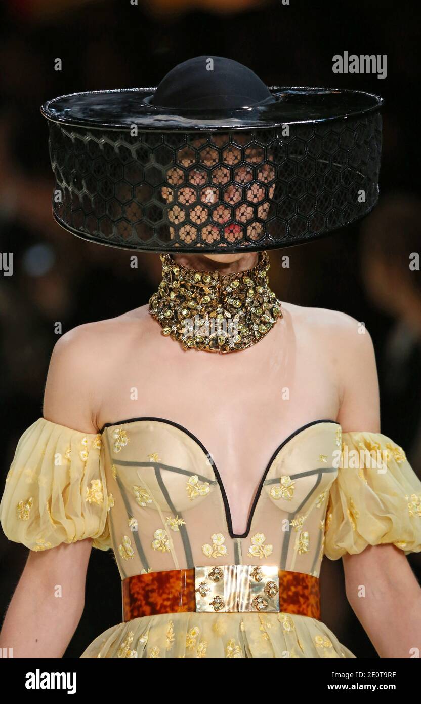 A model displays a creation by British fashiondesigner Sarah Burton for Alexander McQueen Spring Summer 2013 Ready To Wear collection show held at Le 104 in Paris France on October 2 2012. Photo by Al...