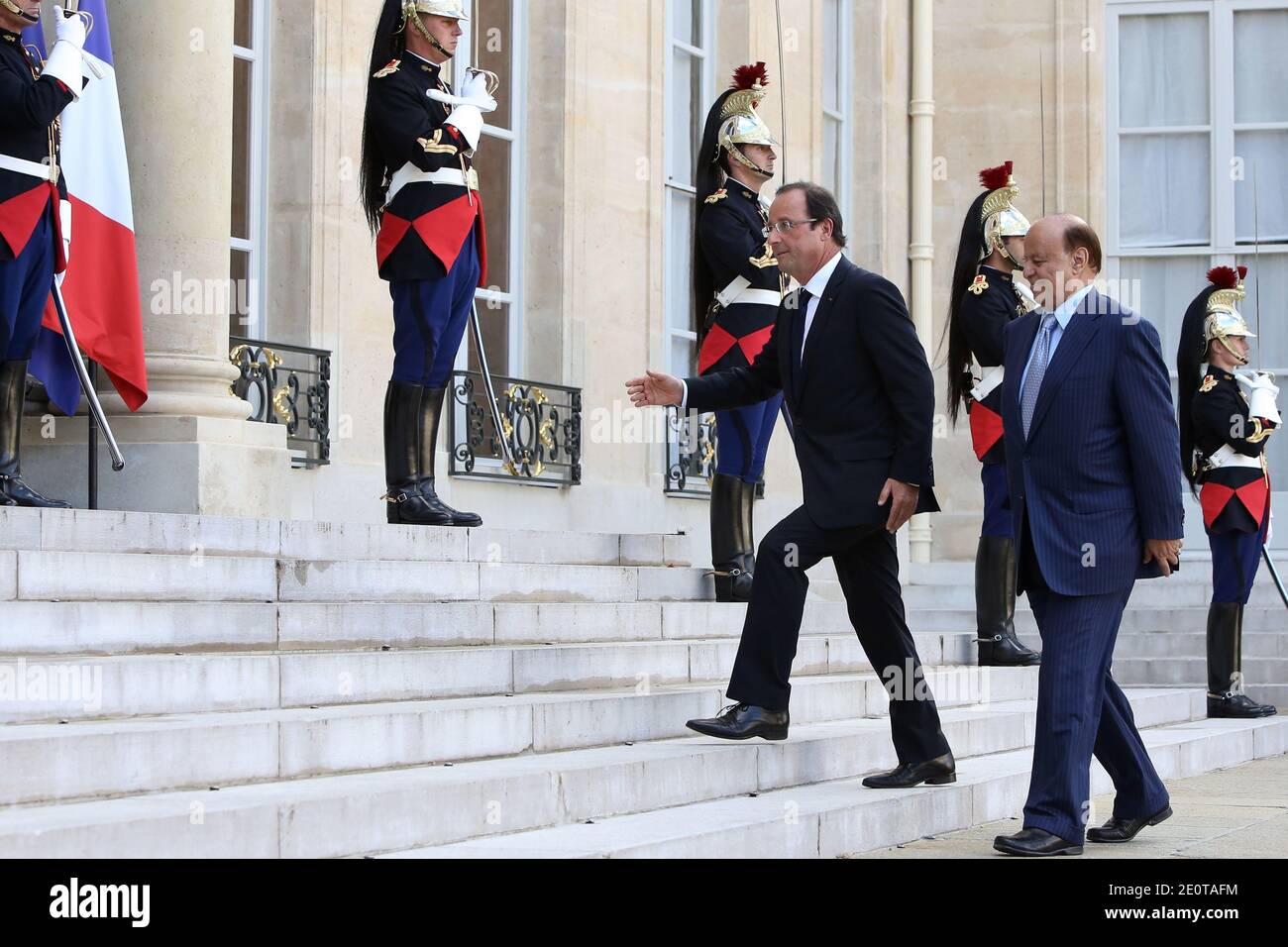 President Francois Hollande greets his Yemeni counterpart Abd Rabbo Mansour Hadi prior to a meeting at the Elysee Presidential Palace, in Paris, France, on October 4, 2012. Photo by Stephane Lemouton/ABACAPRESS.COM. Stock Photo